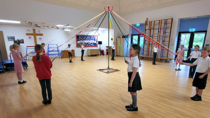 Maple Class, St George's School, get ready for their maypole dance rehearsal