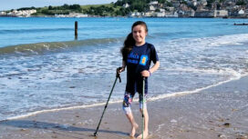 Carmela steps out along Swanage beach to raise funds for Julia's House children's hospice