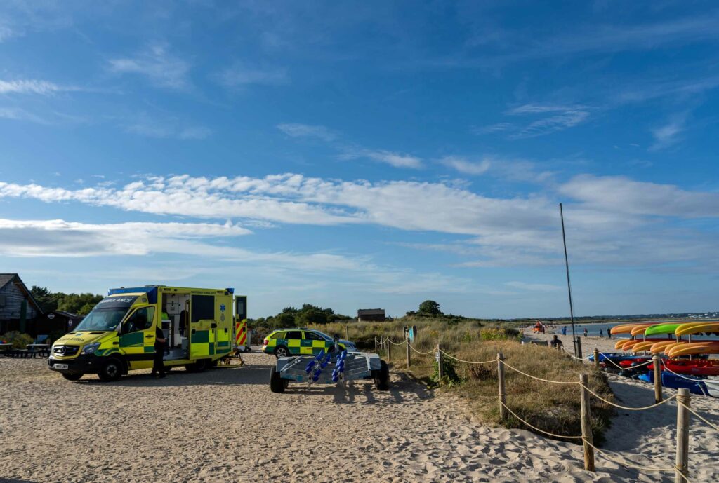 Emergency vehicles at Knoll Beach in Studland